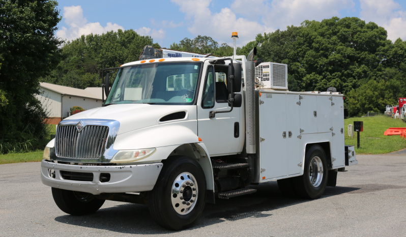 2006 International 4400, DT466, Eaton 10spd, 11′ Brutus Service Body, Maxilift 10,000 Crane, Compressor, Waste Tank, Drawers full