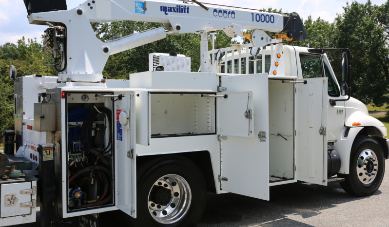 2006 International 4400, DT466, Eaton 10spd, 11′ Brutus Service Body, Maxilift 10,000 Crane, Compressor, Waste Tank, Drawers full
