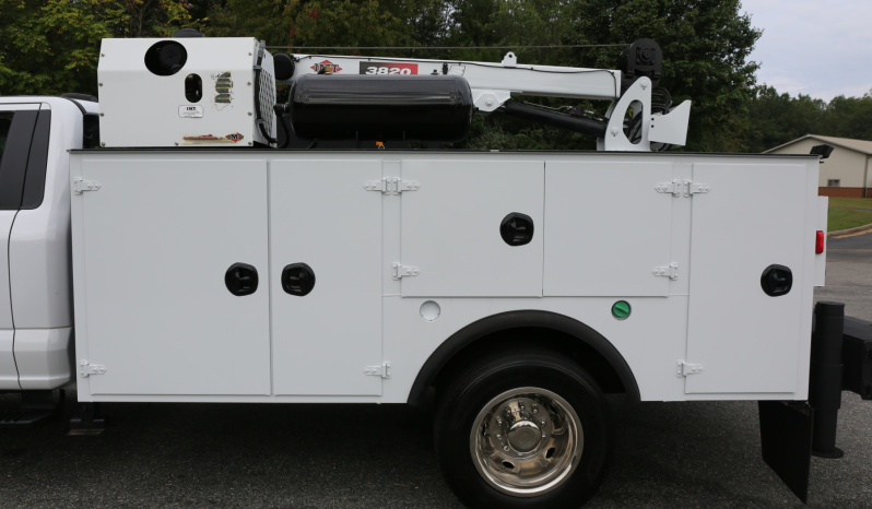 2024 Ford F600, 6.7 Diesel, 4WD, 4500 Miles, 1 Owner, IMT Dominator Bed, 7500# Crane, Hydraulic Compressor, Drawers full